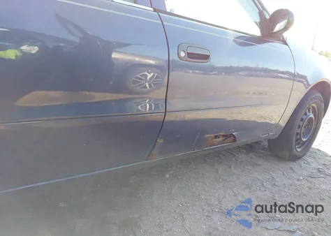 2000 Toyota Corolla Ve/Ce/Le z USA, uszkodzony, nr VIN 2T1BR12EXYC330307